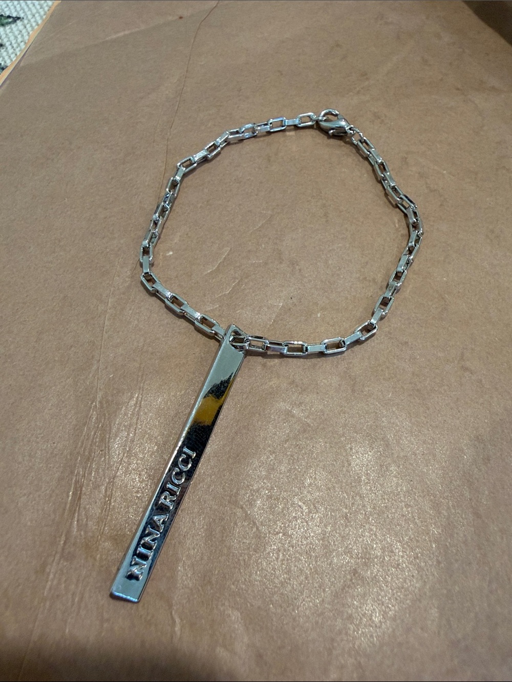Nina Ricci Silver Tone Bar Tag Link Bracelet 7 inches